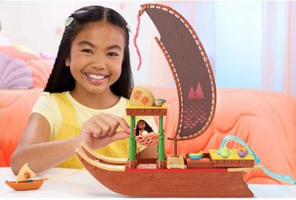 Inspired by Disney’s Moana 2, the theatrical sequel, kids can imagine exploring beyond Motunui with Moana's Adventure Canoe playset complete with Moana small doll and her friend, Heihei, the chicken. There are boundless possibilities for storytelling play with 6 play areas – a water slide, kitchen, hammock, platform, pet hut and pet boat. Transforming play areas enhance the adventure with a platform that rises to reveal a hammock, one that slides to expose the kitchen, a water slide that opens up and a rotating sail! Moana small doll’s arms, neck and legs are all posable for extra action. She wears an outfit inspired by the movie with a removable skirt and measures 3.5 inches! The floating playset extends nearly 2 feet and includes 10 accessories – 2 bowls, 1 cup, a sugar cane wrap, food, a table, a hammock and a small boat for Heihei! Kids ages 3 years and older can collect all the Disney Moana 2 toys to dream up adventures in Motunui and beyond! Each sold separately, subject to availability.